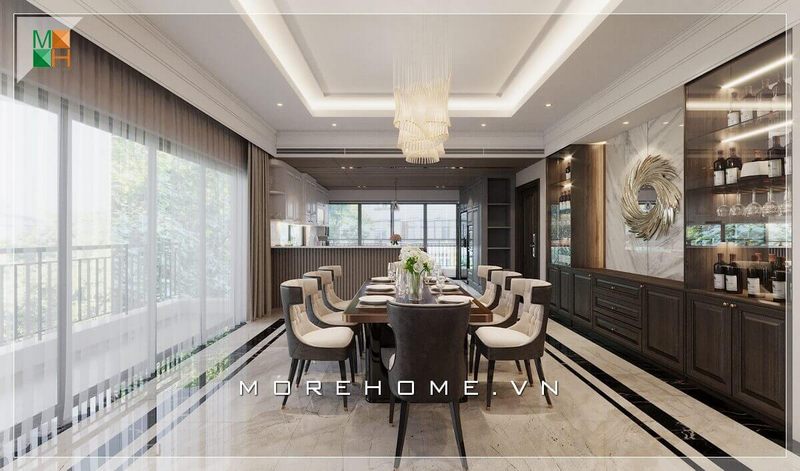 Thiết kế phòng ăn không gian mở với bộ bàn kèm 8 ghế ăn bọc nỉ cao cấp, hệ thống đèn chùm kiểu dáng cầu kỳ mềm mại, mang đến vẻ đẹp tân cổ điển cao cấp, sang trọng cho căn phòng
