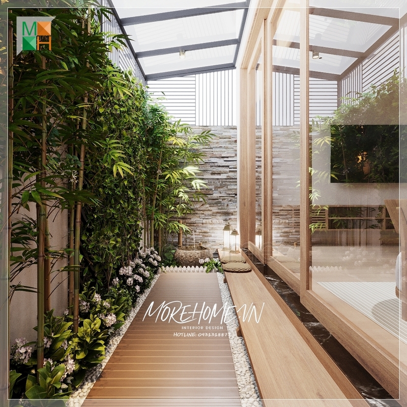 Thiết kế hành lang sân vườn lối đi vào nhà bức tường được phủ một màu xanh tươi mát dễ chịu, đem đến một không gian sống trong lành